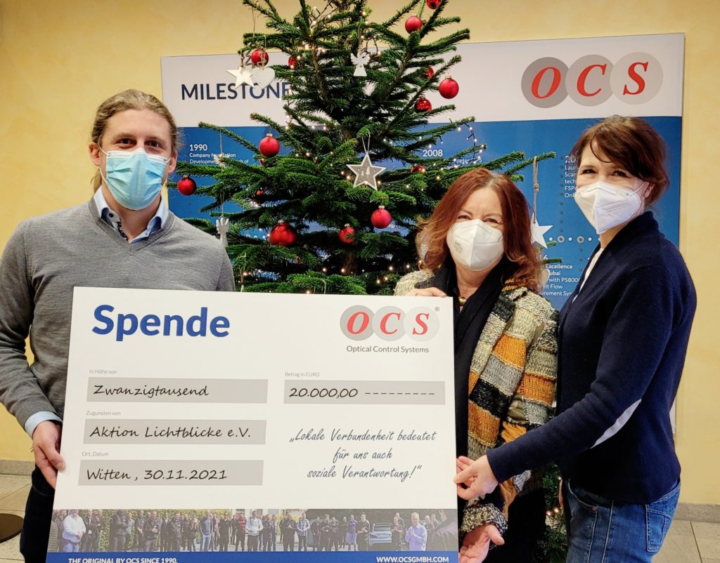 Donation instead of presents - OCS GmbH presents Christmas donation to Aktion Lichtblicke e.V.